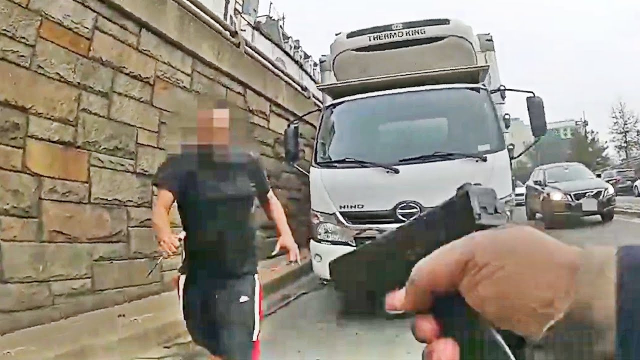 ⁣DC Officer Shoots Man Jumping Out of Ambulance and Charging at The Officer With a Metal Object