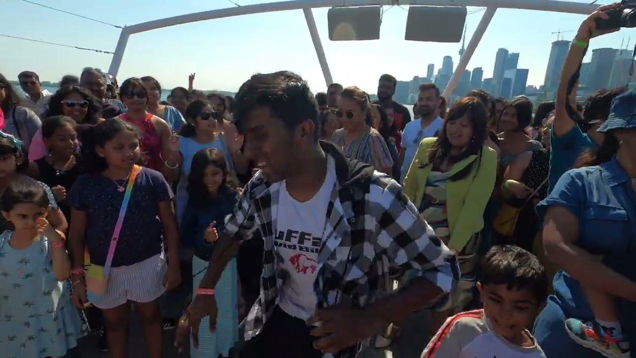 2022 May 29 - KST (Kannada Sangha Toronto) - Cruise Event  -  Rakshith and Kids On Open The Bottle