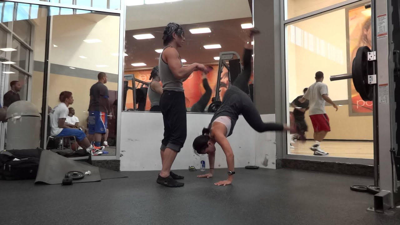 Jessika Holds a Handstand