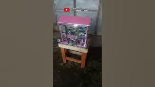 Aquarium mini berbentuk rumah unik.