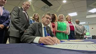 New laws signed to curb gun violence in Delaware