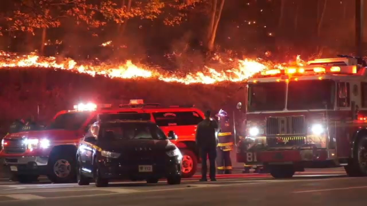 FDNY continues battling brush fire in Inwood Hill Park - YouTube