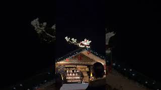 Santa Claus Glides Through the Air on Zipline Sleigh
