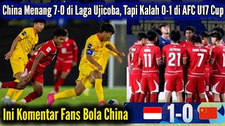 Chinese fans react after their national team was defeated by Indonesia in the AFC U17 Championshi...