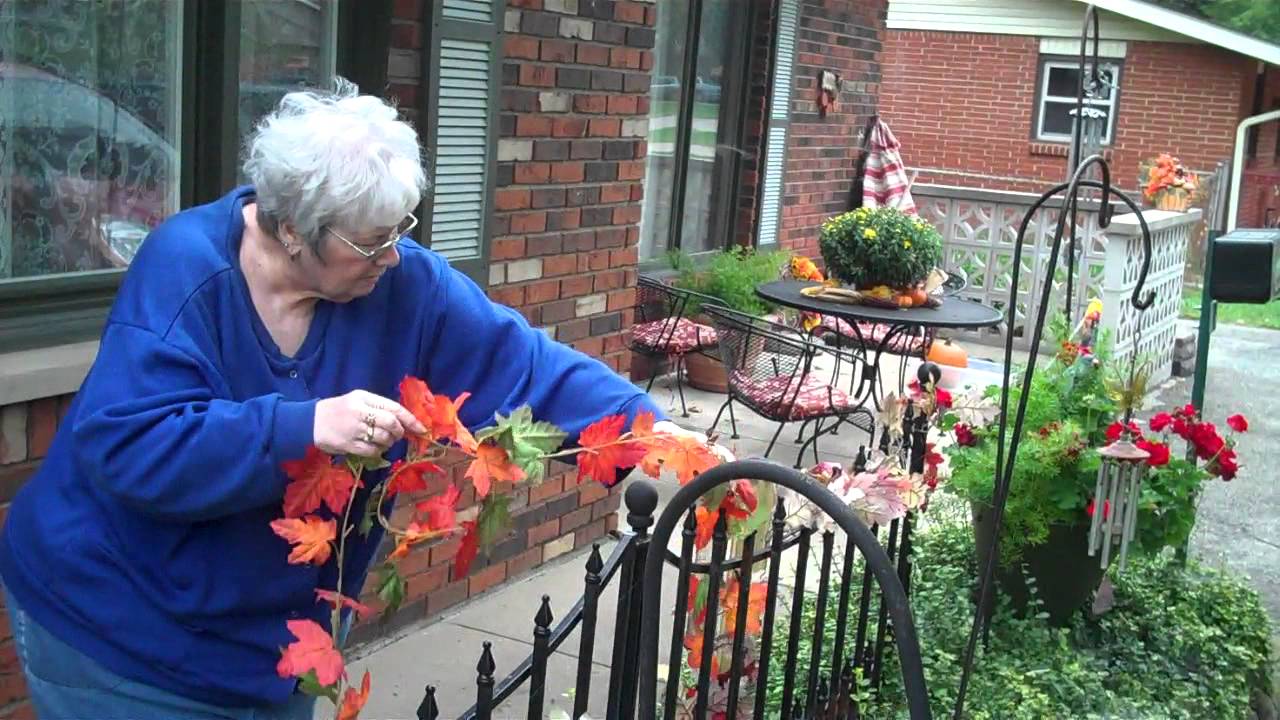 Donna Jean Rueff cleans and decorates the front of the house for Fall on 10-1-2012 A.D. (2)