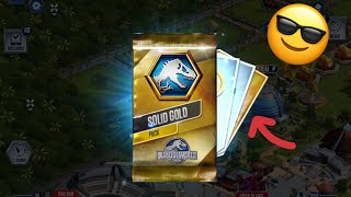 Solid gold card pack opening!!! || Jurassic world the game (ep139)