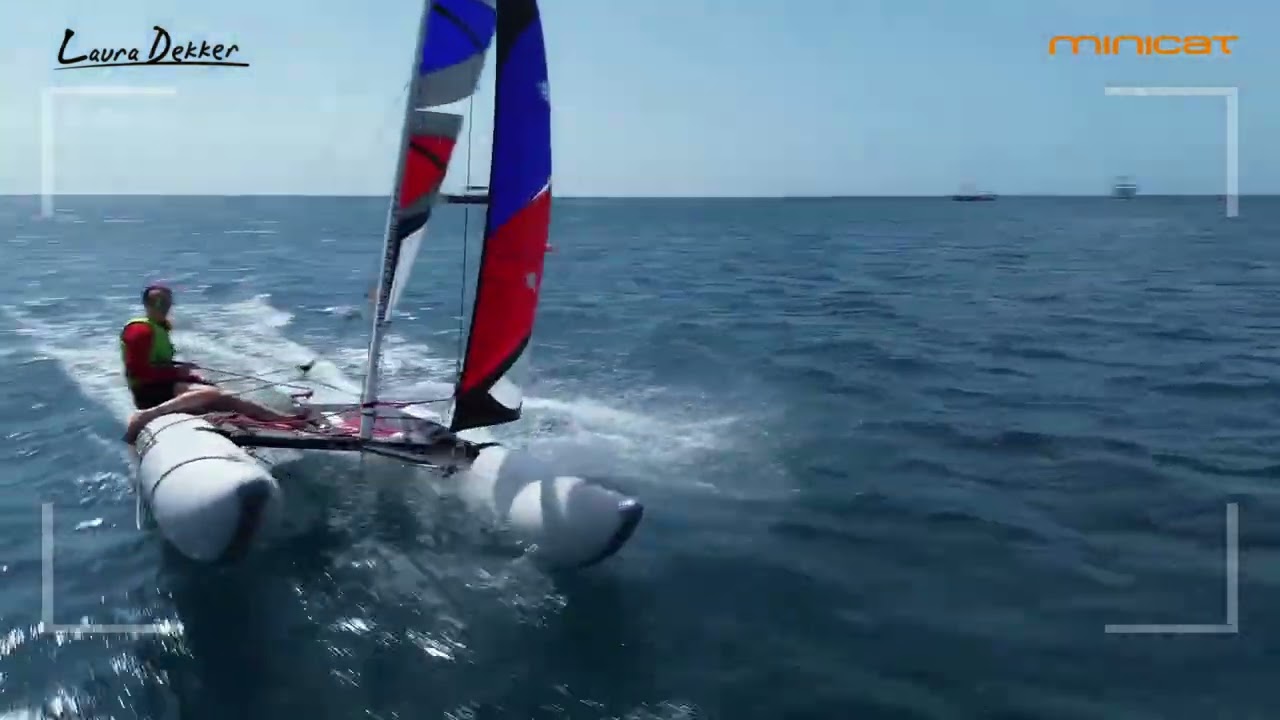 ⁣Laura Dekker sailing her MiniCat 420 'Laura Dekker Edition' in the Caribbean