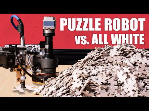 Worlds hardest jigsaw vs. puzzle machine (all white) - YouTube