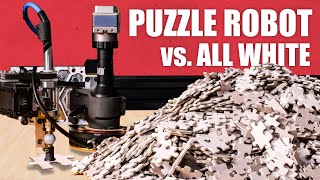 Worlds hardest jigsaw vs. puzzle machine (all white)