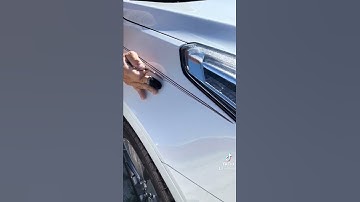 Hand painted custom pinstriping in a Cadillac