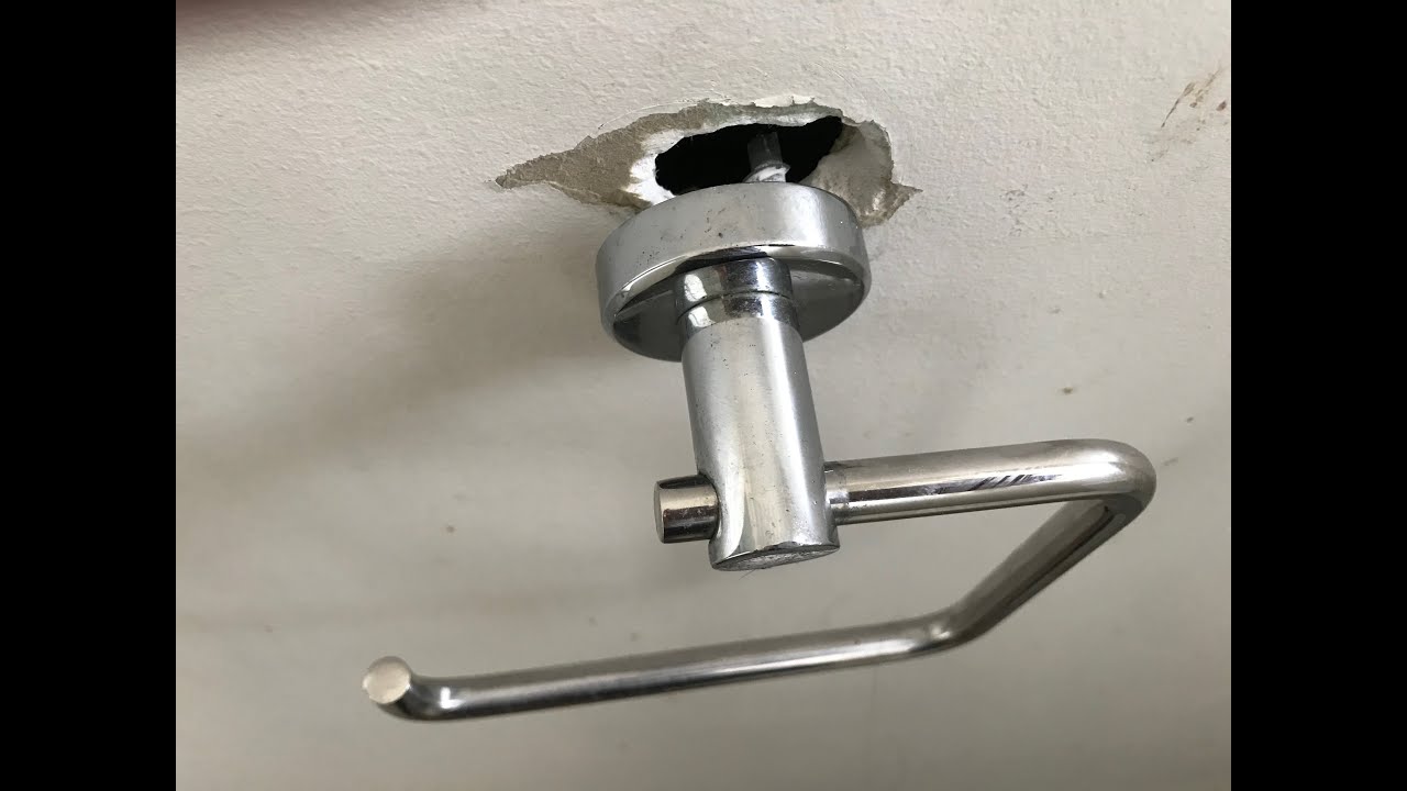 fix hole in wall / toilet roll holder