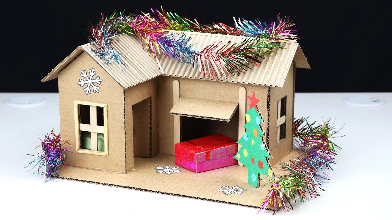 create your own christmas village from cardboard it s fun and you save a lot of money try these t christmas house cute christmas decorations doll house plans
