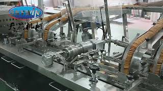 SKYWIN BISCUIT CREAM SANDWICHING MACHINE CONNECTED TO ON-EDGE BISCUIT PACKING MACHINE