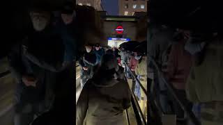 Crowd of people walking to Buckingham Palace in the rain (Green Park station) #shorts