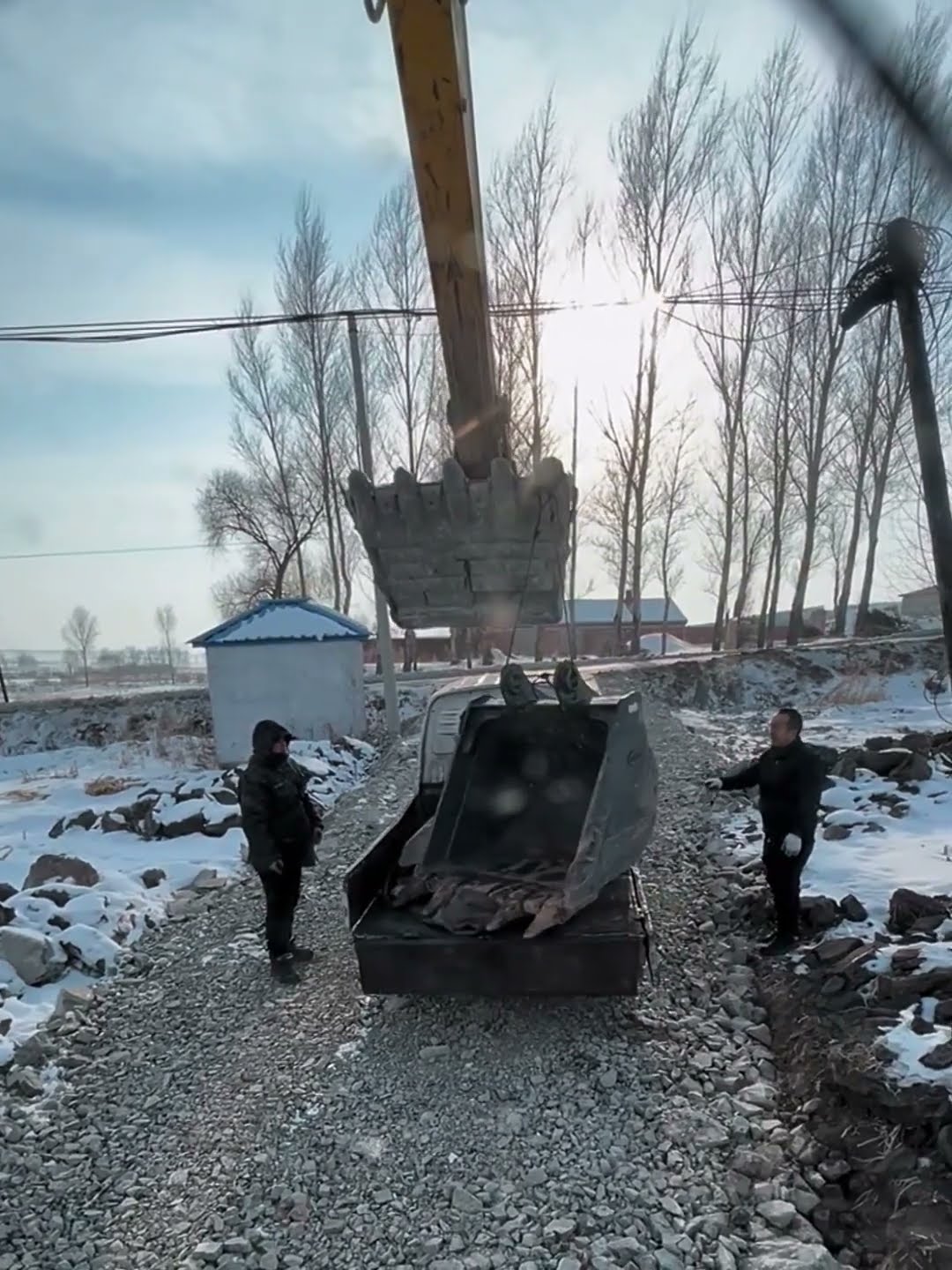 Bucket replacement process outdoors- Good tools and machinery make work easy
