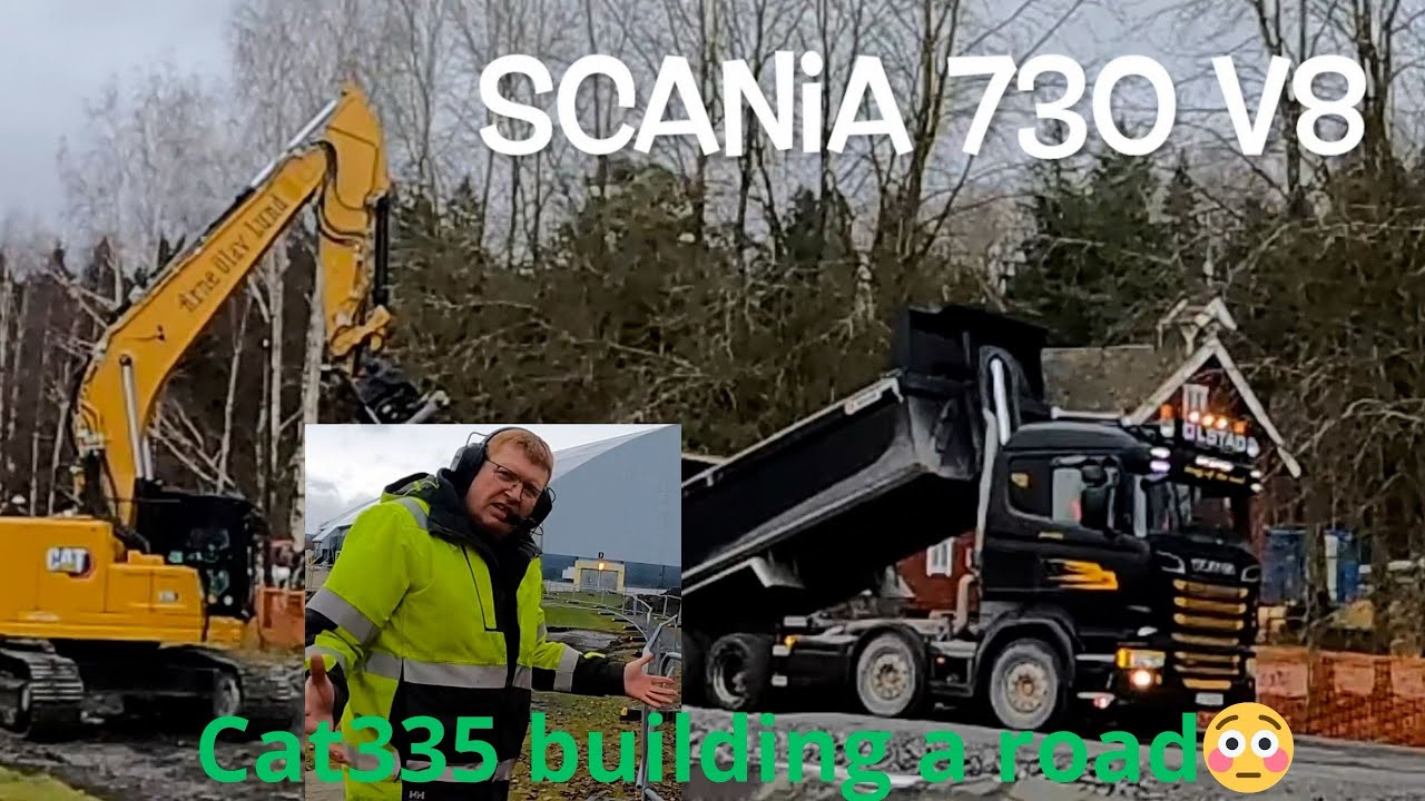 Caterpillar 335 and a scania trucks building a construction road😀