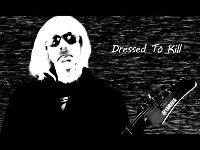 Electric Tomb - Dressed To Kill (Official Video) auf YouTube ansehen Electric Tomb - Dressed To Kill (Official Video) auf YouTube ansehen