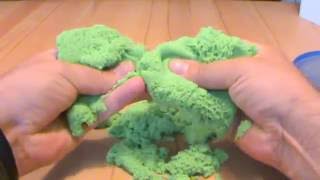 Kinetic sand in green. look, feel, motion