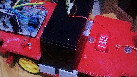 MY CAR ROBOT WITH OBSTACLE DETECTOR USING PIC MICRO-CONTROLLER.