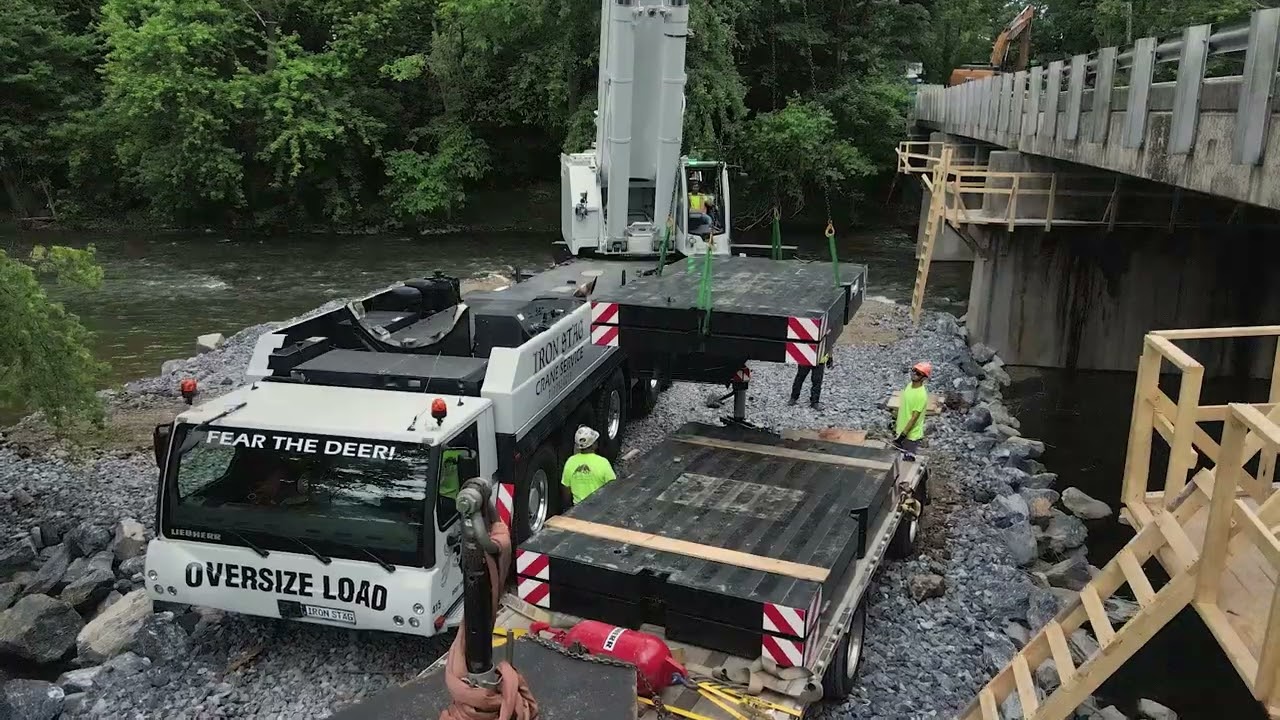 IRON STAG'S 550 ton Liebherr LTM 1450-8.1 Setting Bridge Beams.