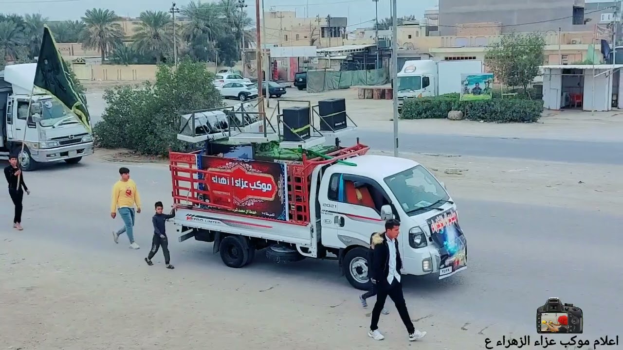 اعلام موكب عزاء الزهراء ع .تصوير محمد عدنان * سلام العبودي