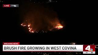 Brush fire burns in West Covina on Fourth of July
