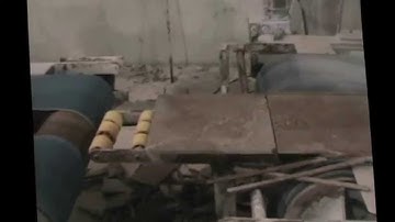 producing filled and honed travertine tiles