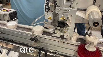 QLC Wrap Labeling with lid labeling - Label-Aire