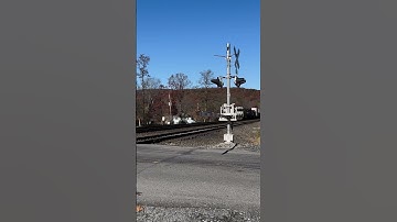 AC44C6M leading with dash 9 trailing on a 3 engine consist!