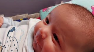 Beautiful laughing of a cute baby boy: cute baby laughing with herself