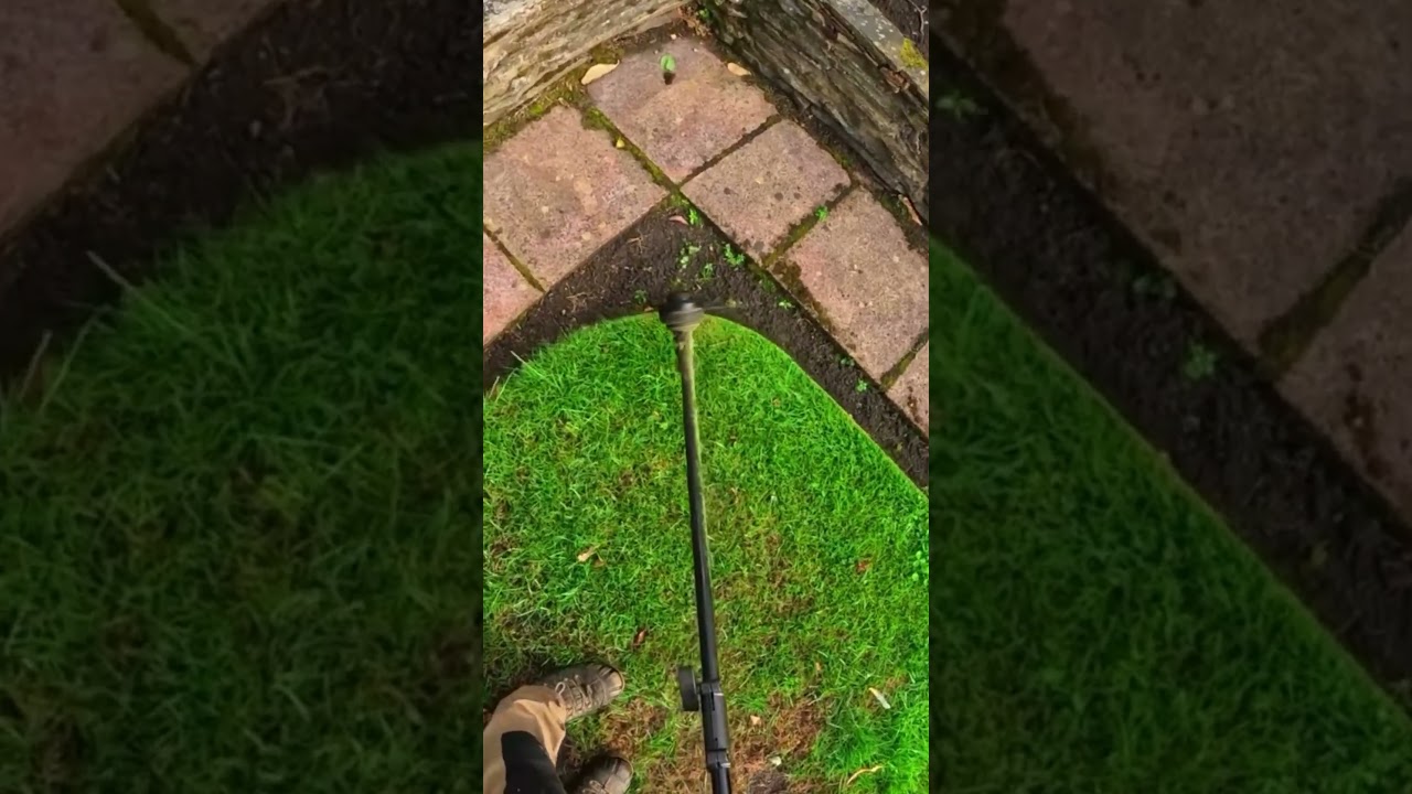 the process of cutting the ends of grass that has started to grow long so that it is neat