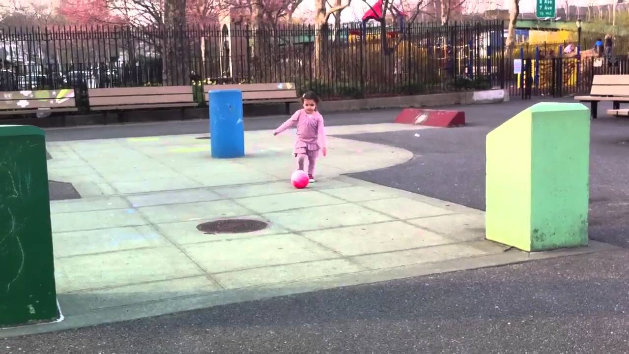 Kicking a Ball at the Playground - YouTube