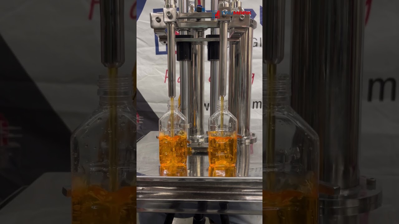 2 HEAD LIQUID FILLING MACHINE