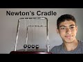 How do Newton&#39;s Cradles work?