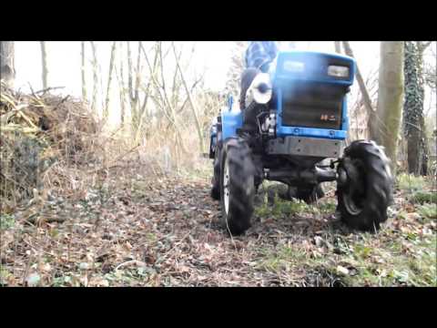 Tree hugging with an Iseki TX1000 and a Chinese 65cc chainsaw