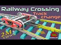 How does train change track  railway crossing