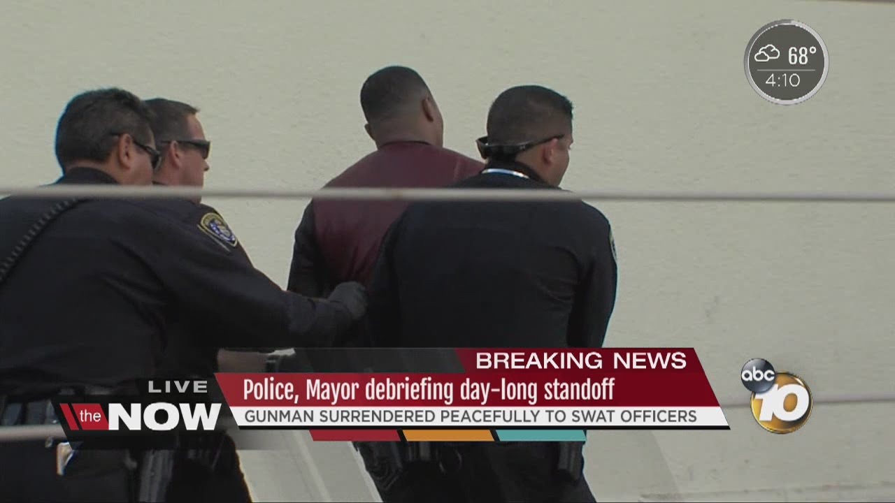 Suspected gunman surrenders peacefully after hours-long standoff - YouTube