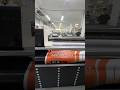 How does a vision-guided hybrid UV printer print roll materials for vehicle decals?
