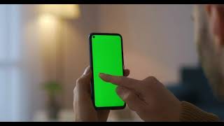 Man is using smartphone green screen