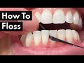 Dental hygienist teaches how to floss