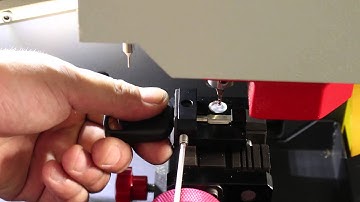 How to cut a Ford Tibbe Key FO21 on SEC E9 key cutting machine in German Language