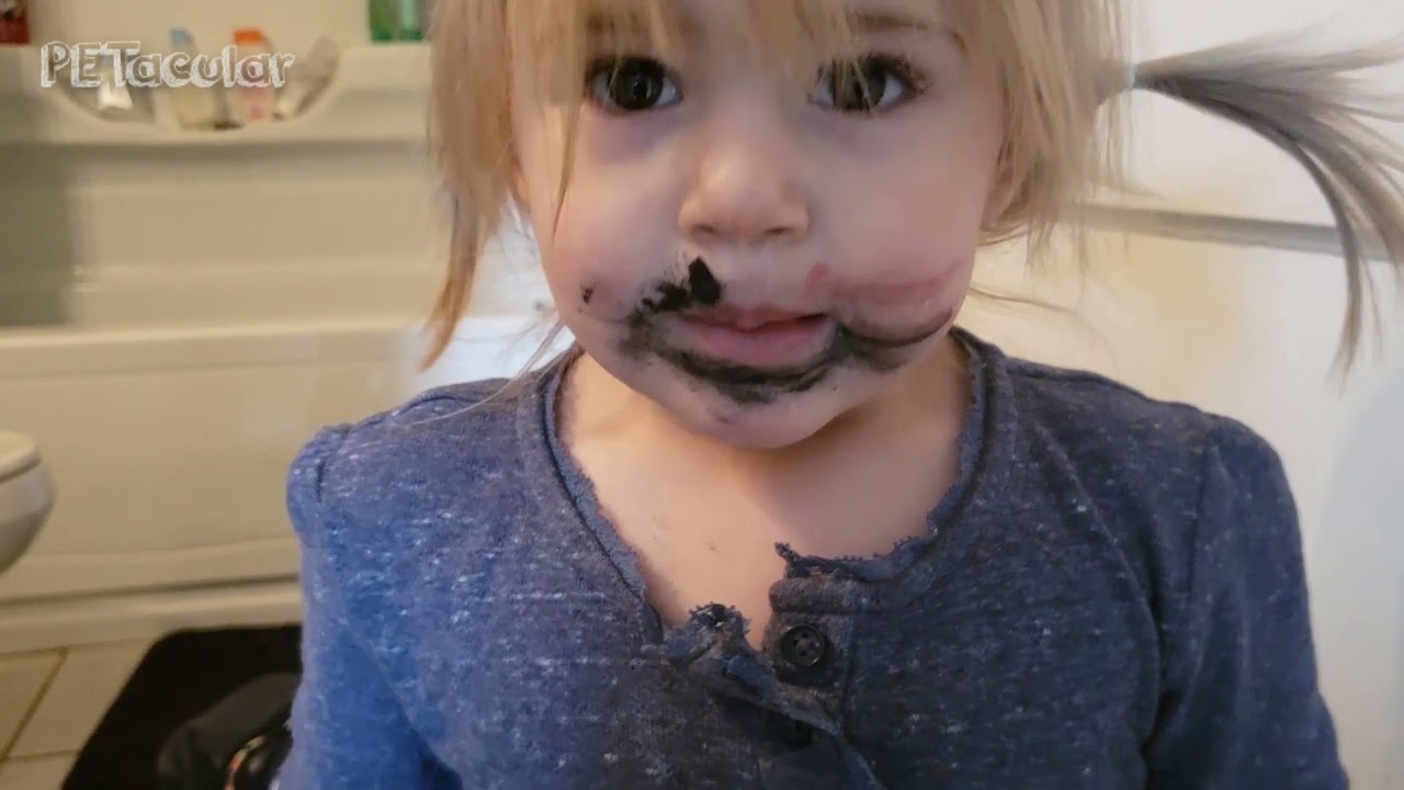 Funny Baby Getting into Moms make-up