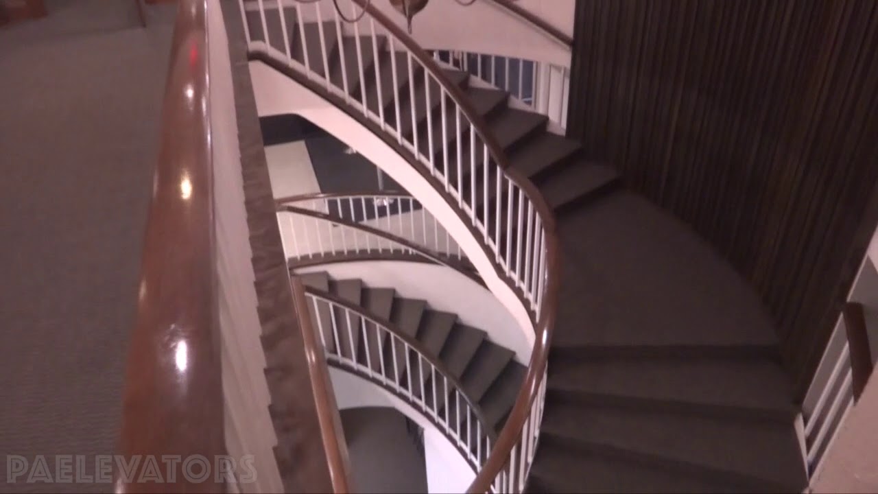 White 1960's Marshall Elevator with CJ Anderson Fixtures GNC world HQ