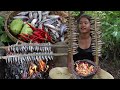 Yummy Fish grilled tasty vs Green mango hit with hot chili for eating delicious in forest