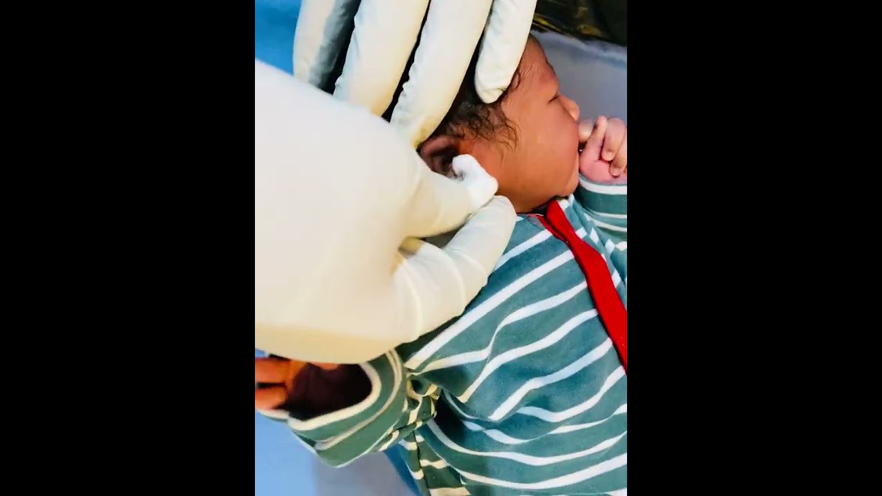 How to pierce a newborn baby ear newborn first piercing YouTube