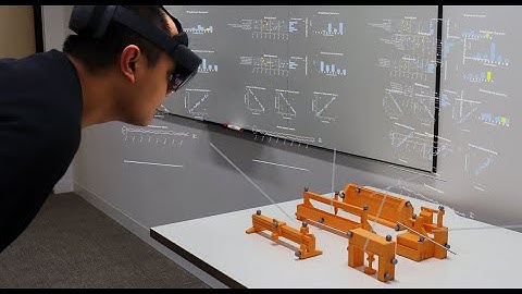 Augmented Scale Models: Presenting Multivariate Data Around Physical Scale Models in AR