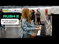 Piano girl plays rush e in the barcelona subway 