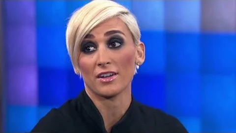 'L-Word' cast member defends dating man