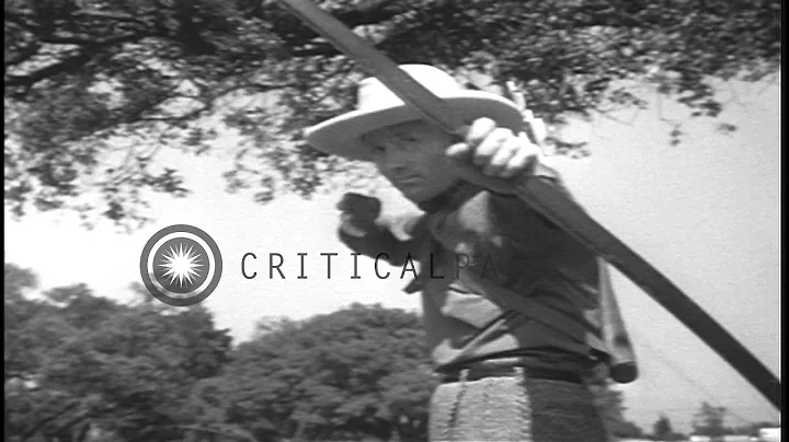 American archer Ken Wilhelm demonstrates his skill...