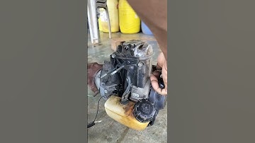 Check the engine compression of the brush cutter after replacing the ignition coil.